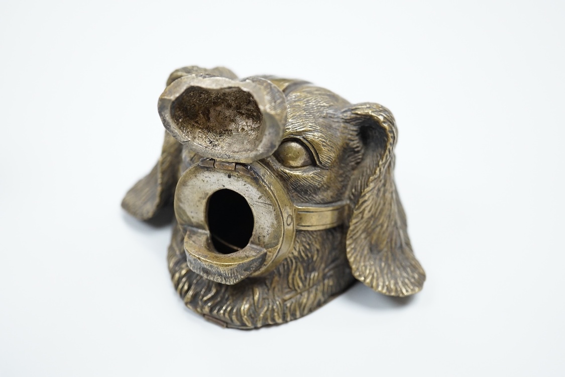 A novelty dog's head Pastille burner and bronze monkey, largest 11cm wide